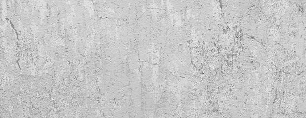 Light gray weathered stone wall with cracks. Concrete wall background texture.