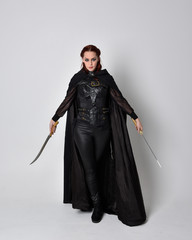 fantasy portrait of a woman with red hair wearing dark leather assassin costume with long black...