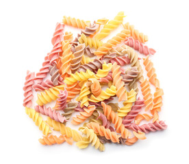 Uncooked pasta on white background