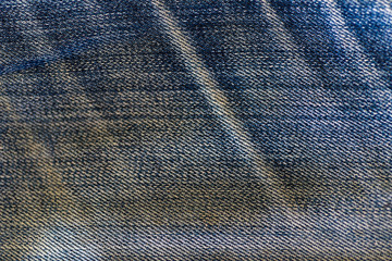 close up texture of old blue jean, abstract design for art background