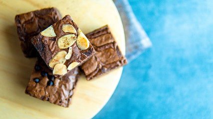 brownies cut in squares. Dark food photography concept