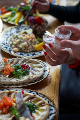 Table of enjoying food with family and friends top view