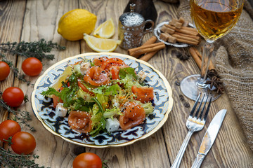Salad from tomatoes, cucumber, red onions and lettuce leaves. healthy summer vitamin menu. vegan vegetable food. vegetarian dinner table. top view. flat lay