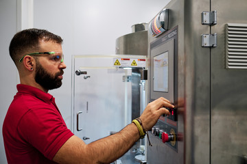 modern industrial machine operator at work