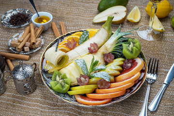 Healthy salad with fresh exotic fruit