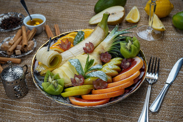 Healthy salad with fresh exotic fruit