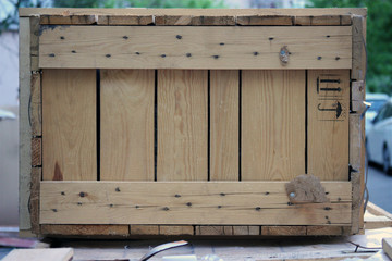 wooden boarded up box container close up