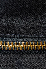 Macro vertical close up look of zipper replacemeant part, background
