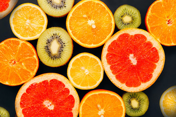 Citrus fruits background flat lay