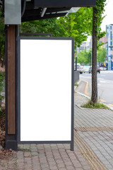 White empty advertising mock-up at bus stop, close-up, the front view