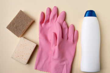 Eco sponges, pink rubber gloves, detergen in bottle. Cleaning servise and housekeeping concept. Flatlay