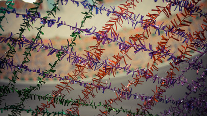 colorful paper string tied in boxes above