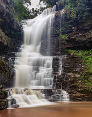 Slower Shutter speed to enhance milky water Kloof waterfall gorge South Africa