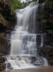 Fototapeta na wymiar Waterfall in Kloof South Africa.In valley along Hiking trail