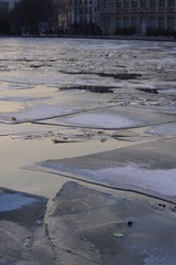 Ice lake surface, frozen river with ice tiles
