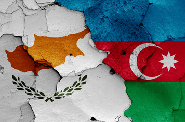flags of Cyprus and Azerbaijan painted on cracked wall