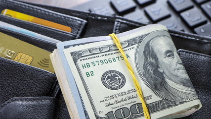 Getting a loan or credit in US dollars. The calculation of the payment at the cashier.USA Dollar...