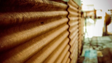 Orange metal wall mounted on the wall