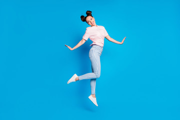 Full length body size view of nice attractive lovely cute pretty sweet funny feminine slim fit thin cheerful cheery girl jumping posing going isolated bright vivid shine vibrant blue color background