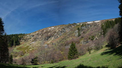 Fototapeta premium View of Velky Kotel valley in summer Jeseniky mountains, Czech Republic. Hillside with prominent rock formations.
