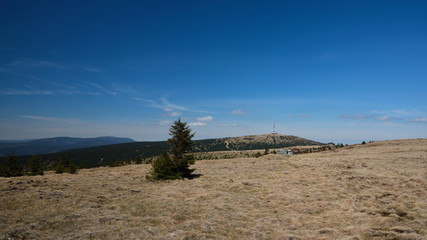 View of Petrovy Kameny and Praded transmitter tower in Jeseniky mountain ridge. Czech Republic