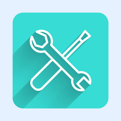 White line Screwdriver and wrench spanner tools icon isolated with long shadow. Service tool symbol. Green square button. Vector Illustration
