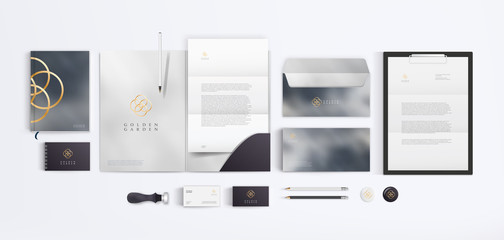 Vector corporate identity style design template for branding company and stationery mockup. Golden logo and stone texture on light background.