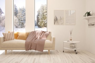 White living room with sofa and winter landscape in window. Scandinavian interior design. 3D illustration