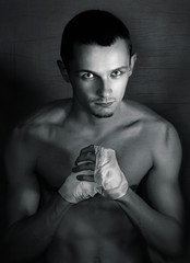 Serious young man boxer