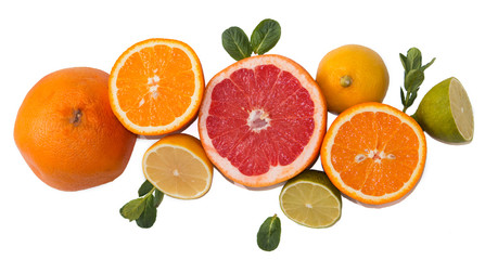 Citrus fruit with green mint leaves isolated on a white background