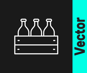 White line Bottles of wine in a wooden box icon isolated on black background. Wine bottles in a wooden crate icon. Vector Illustration