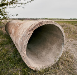 old and abandoned concrete manhole pipe