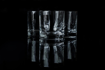 glass glasses for whiskey on a black background