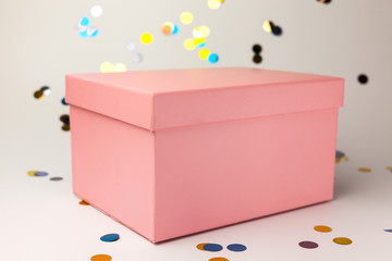 gift box with gift or voucher card on white background