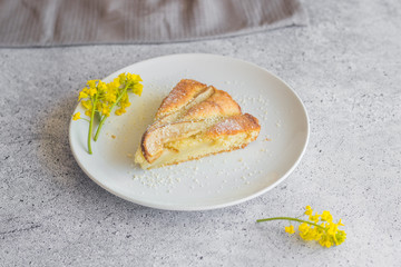 Delicious pear and almond pie. Romantic summer composition with flowers