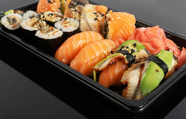 Plastic Container with Sushi Set Ready for Takeout Delivery
