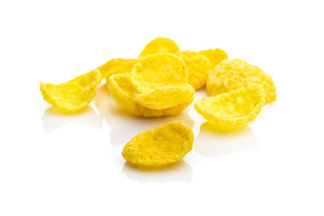 Cereals breakfast. Healthy Superfood corn flakes isolated on white background. Healthy eating, dieting and detoxication concept, space for text. Macro close-up shot.