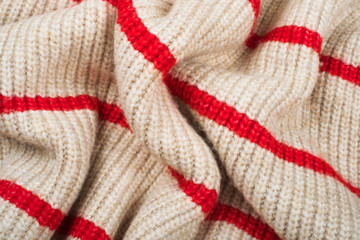 Cozy background of knitted texture with stripes