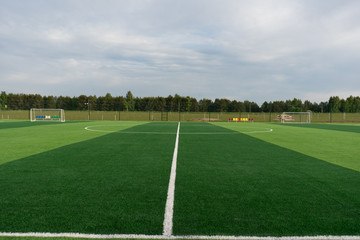 Fototapeta na wymiar An empty soccer field with no players