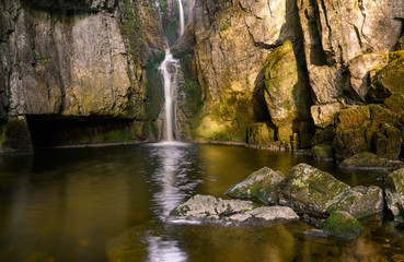 Fototapeta na wymiar Catrigg Force is a waterfalls in the Yorkshire Dales and was a favourite spot of the composer Edward Elgar.