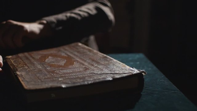 Monk is reading an old book