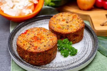 Tasty vegetarian food, burgers with Greek feta cheese, sweet red paprika, green olives and zucchini