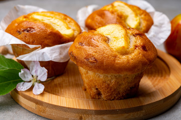 Fresh baked muffins with apple and cinnamon close up