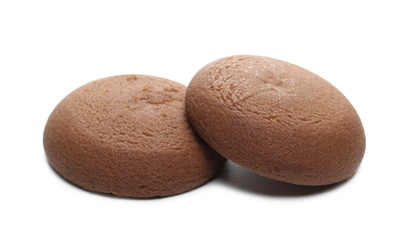 Fototapeta na wymiar Round chocolate cakes, pastries with creamy filling isolated on white background