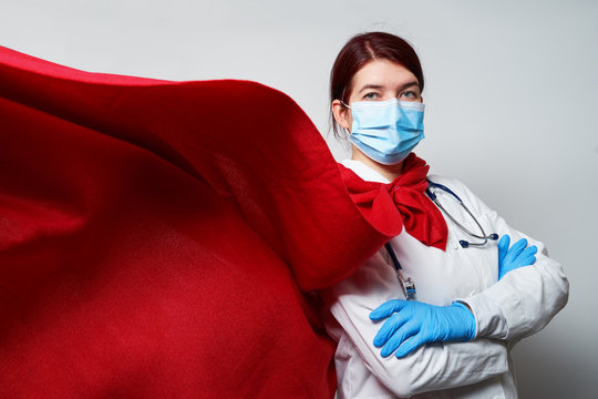 Doctor Wearing Surgical Face Mask In Superhero Cape.