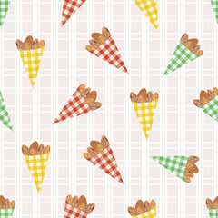 Vector roasted almond nuts in cute gingham paper bags seamless pattern background. Brown oval seeds on pastel plaid backdrop. Kernel shells repeat for food fair, confectionery, farmers market concept