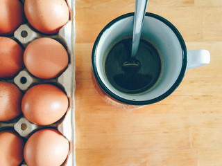Easy and simple homemade breakfast of coffee and eggs.