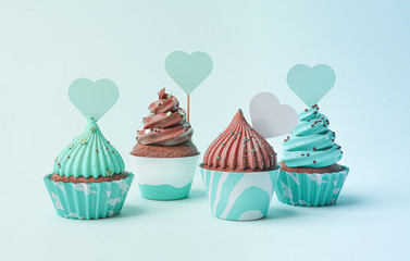 cupcakes with icing and sprinkles