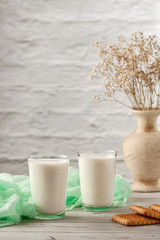 Homemade kefir or yogurt with probiotics on a white background with copy space. Kefir Lose weight...