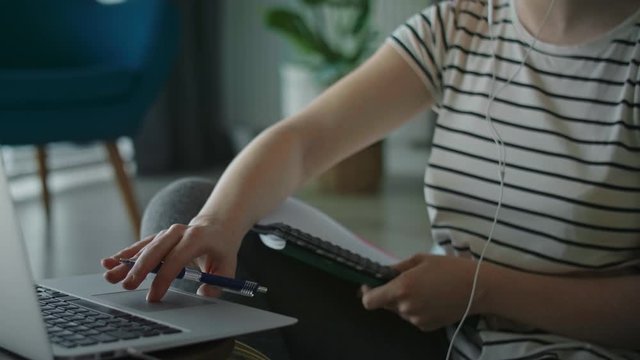 Video of young woman during e-learning at home